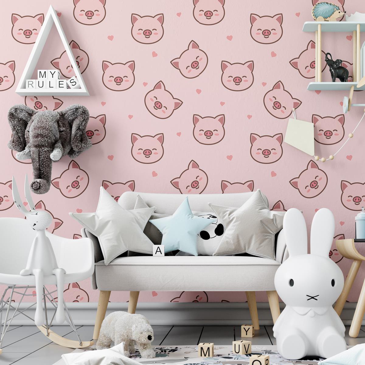 sofá com pelúcias e ao fundo um papel de parede com estampa de porquinho rosado